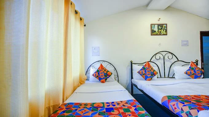Family suite beds and textured wall