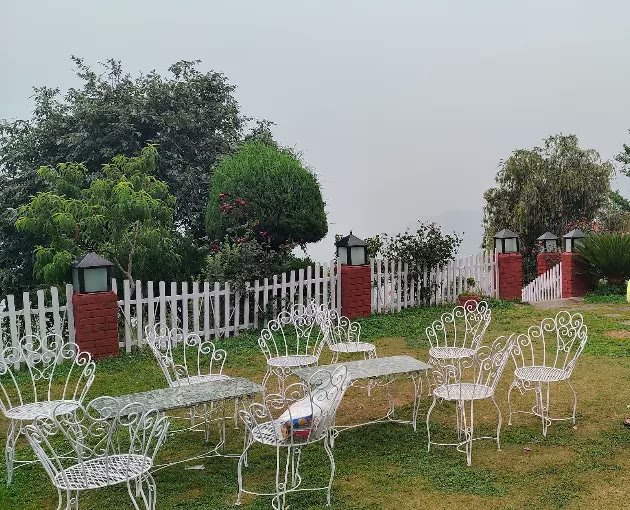 Outdoor grounds and camping environment at Kanatal Camp